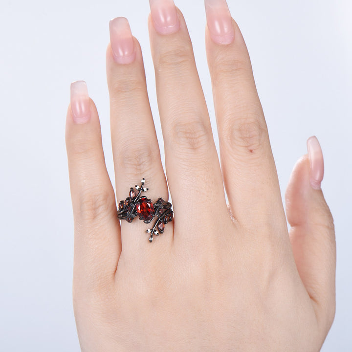 Nature inspired oval garnet engagement ring set black gold unique leaf gothic wedding ring set knight twig vine January birthstone jewelry - PENFINE