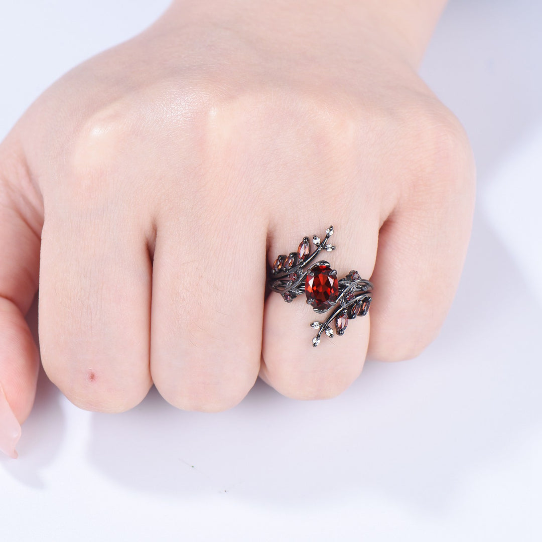 Nature inspired oval garnet engagement ring set black gold unique leaf gothic wedding ring set knight twig vine January birthstone jewelry - PENFINE