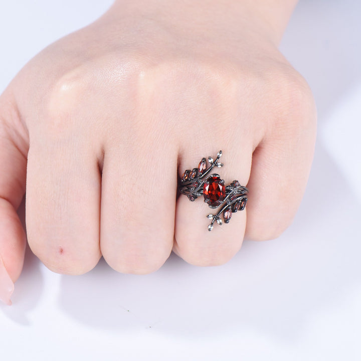 Nature inspired oval garnet engagement ring set black gold unique leaf gothic wedding ring set knight twig vine January birthstone jewelry - PENFINE