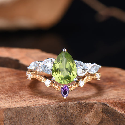 Pear Cut Peridot Engagement Ring Set Nature Inspired Gold Leaf Twig Bridal Set