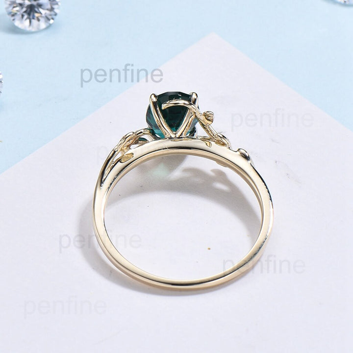 Filigree Leaf Flower Oval Lab Emerald Solitaire Engagement Ring - PENFINE