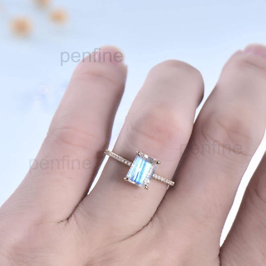 Emerald Cut Rainbow Moonstone Diamond Engagement Ring hand