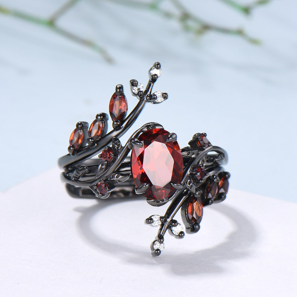 Nature inspired oval garnet engagement ring set black gold unique leaf gothic wedding ring set knight twig vine January birthstone jewelry - PENFINE