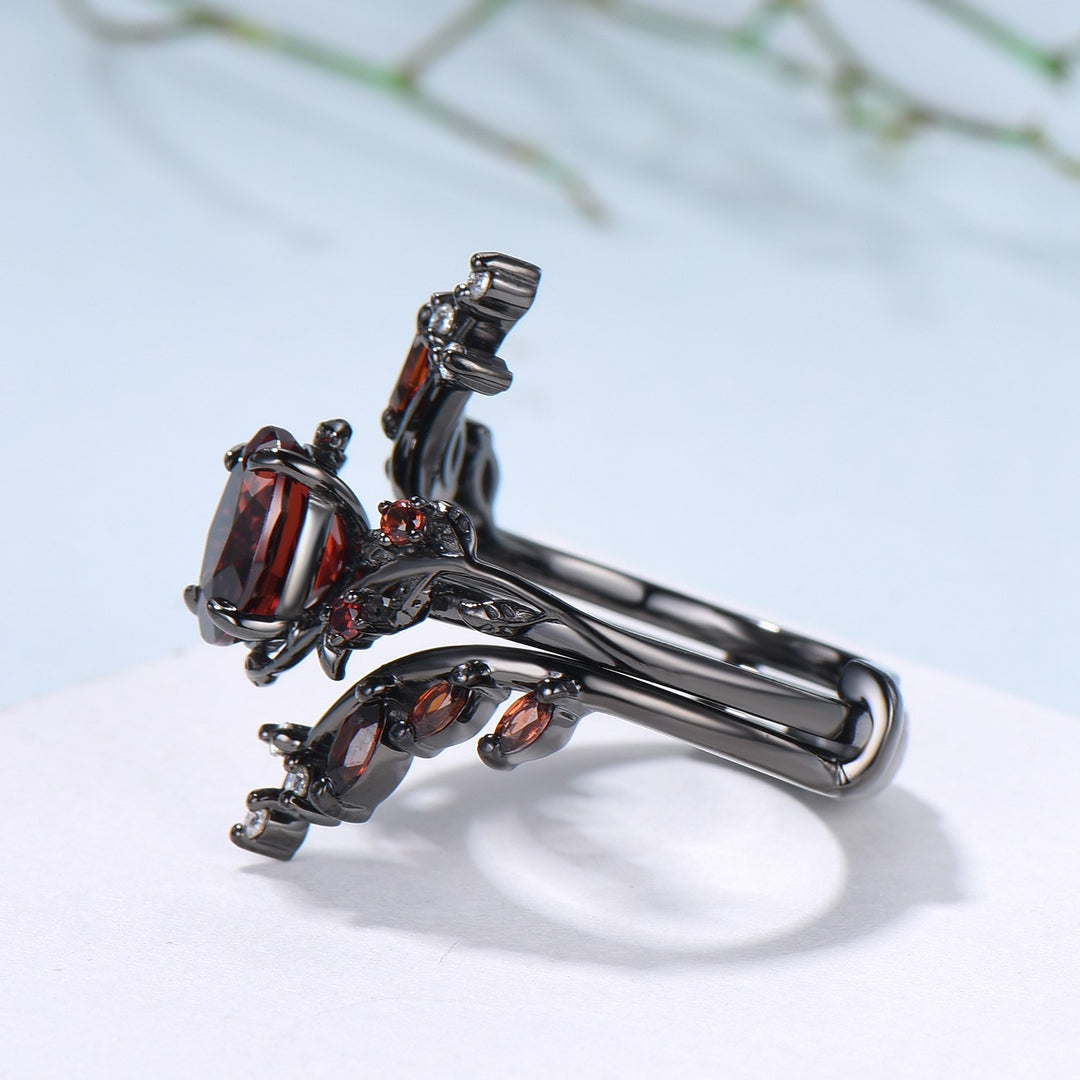 Nature inspired oval garnet engagement ring set black gold unique leaf gothic wedding ring set knight twig vine January birthstone jewelry - PENFINE