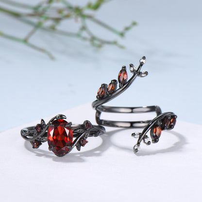 Nature inspired oval garnet engagement ring set black gold unique leaf gothic wedding ring set knight twig vine January birthstone jewelry - PENFINE