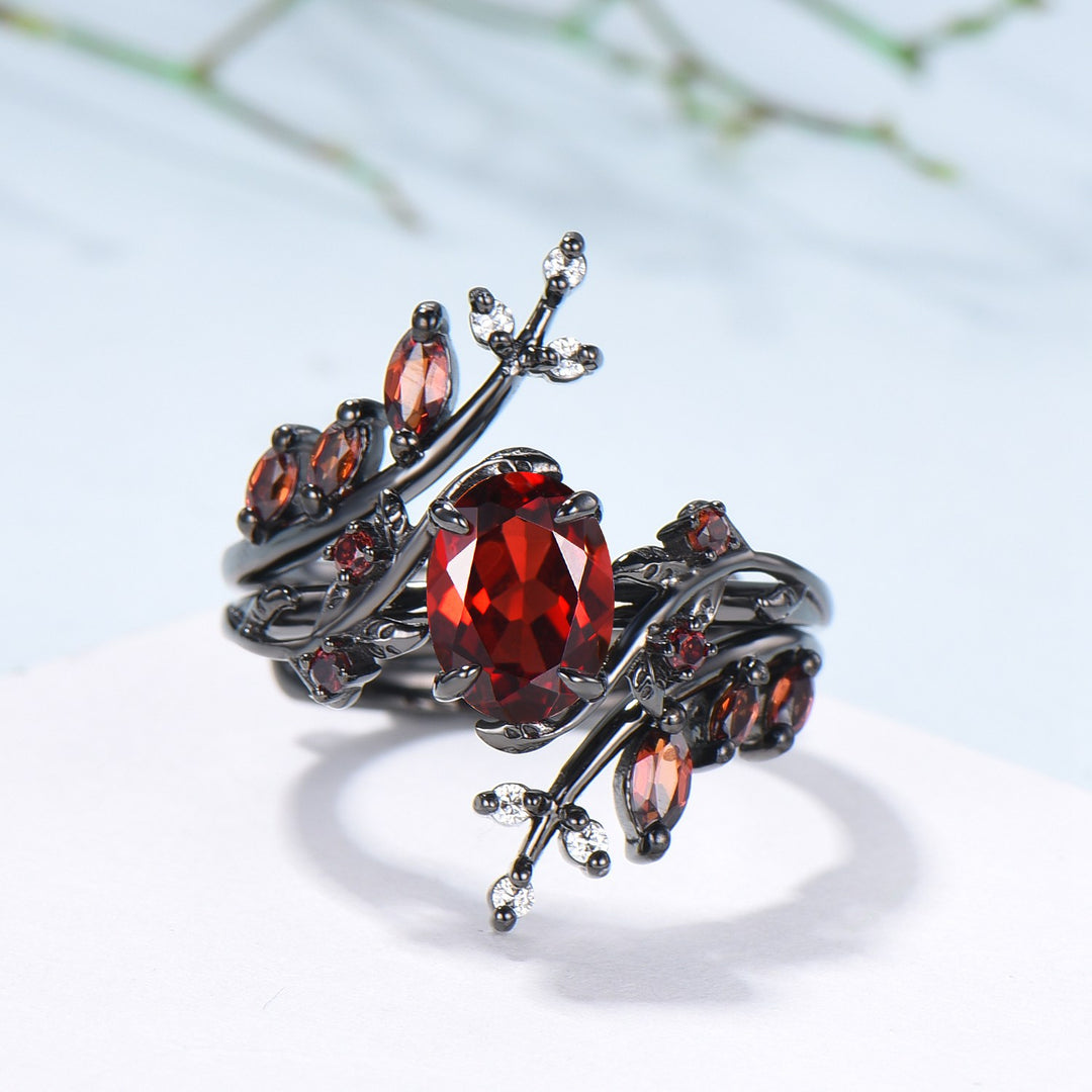 Nature inspired oval garnet engagement ring set black gold unique leaf gothic wedding ring set knight twig vine January birthstone jewelry - PENFINE