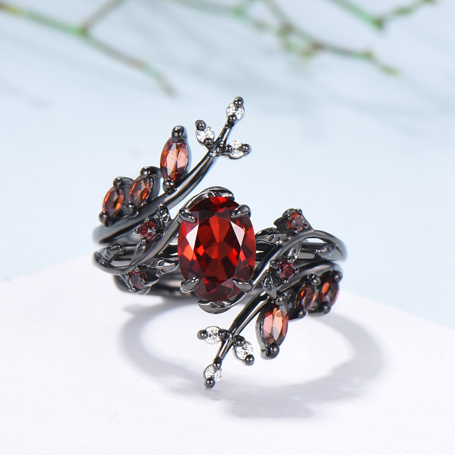 Nature inspired oval garnet engagement ring set black gold unique leaf gothic wedding ring set knight twig vine January birthstone jewelry - PENFINE
