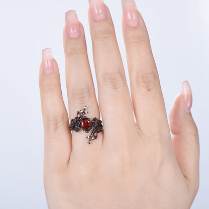 Nature inspired oval garnet engagement ring set black gold unique leaf gothic wedding ring set knight twig vine January birthstone jewelry - PENFINE