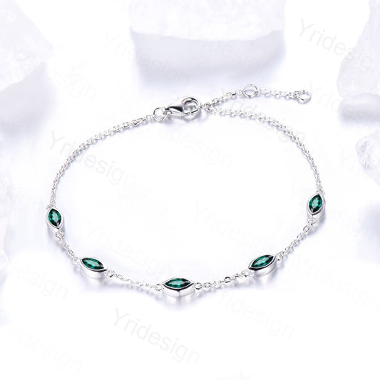 Dainty marquise cut Emerald bracelet bezel set - PENFINE