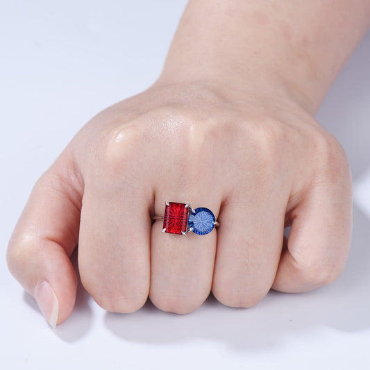 You and Me | Starburst Emerald Cut Blue Sapphire and Round Red Ruby Toi et Moi Engagement Ring