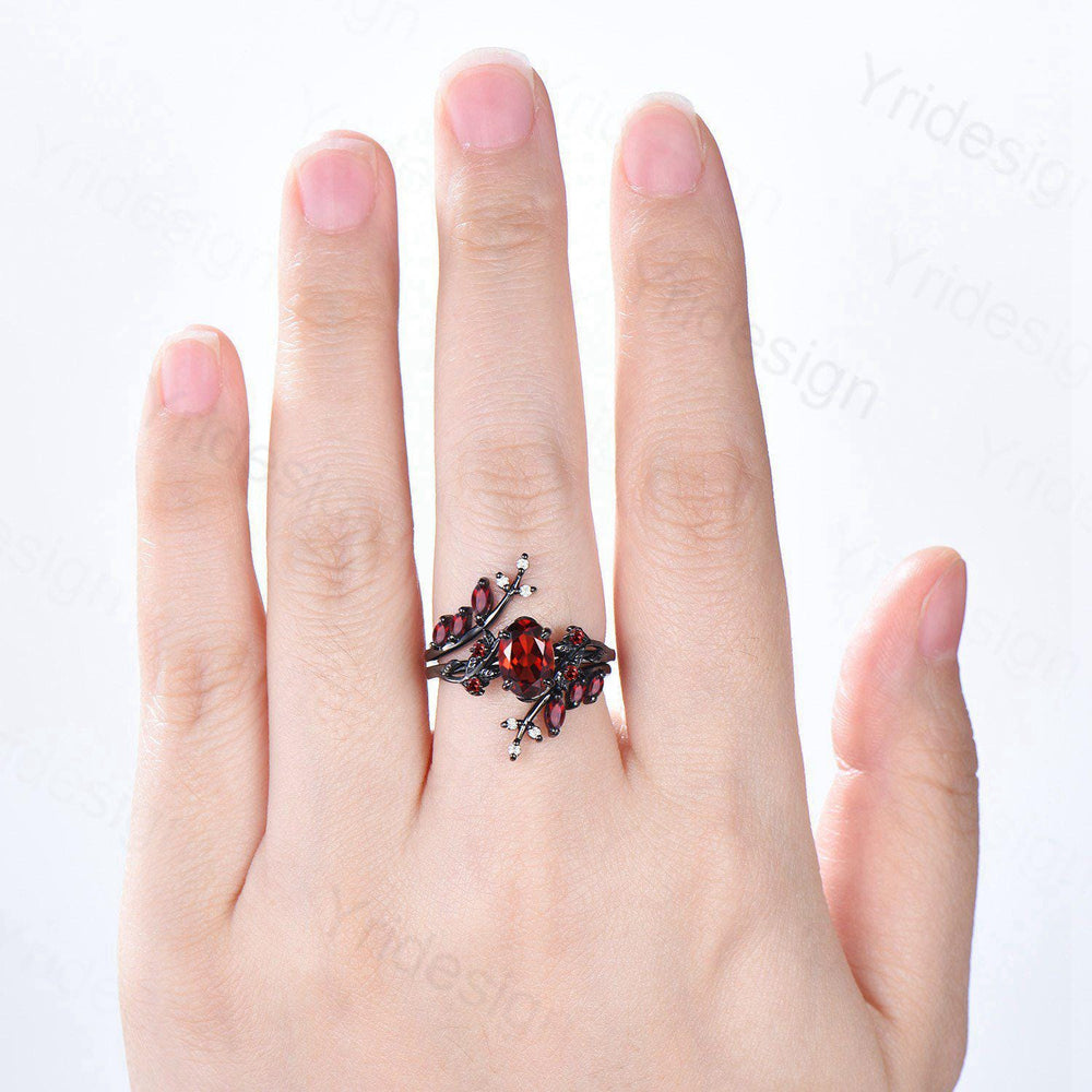 Nature inspired oval garnet engagement ring set black gold unique leaf gothic wedding ring set knight twig vine January birthstone jewelry - PENFINE