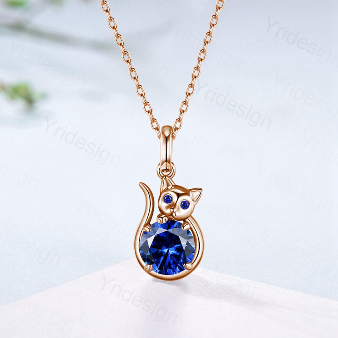 Elegant Cat Blue Sapphire Pendant Necklace with Emerald | Silver September Birthstone Animal Jewelry for Cat Lovers - PENFINE