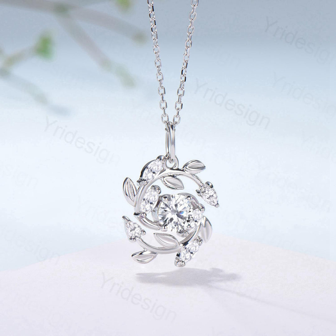 All stones are moissanite or lab grown diamonds 4pcs 4x2mm marquise cut 2pcs 3x2mm pear shaped 1pc 5mm round cut Chain: 16-18 Inches - PENFINE