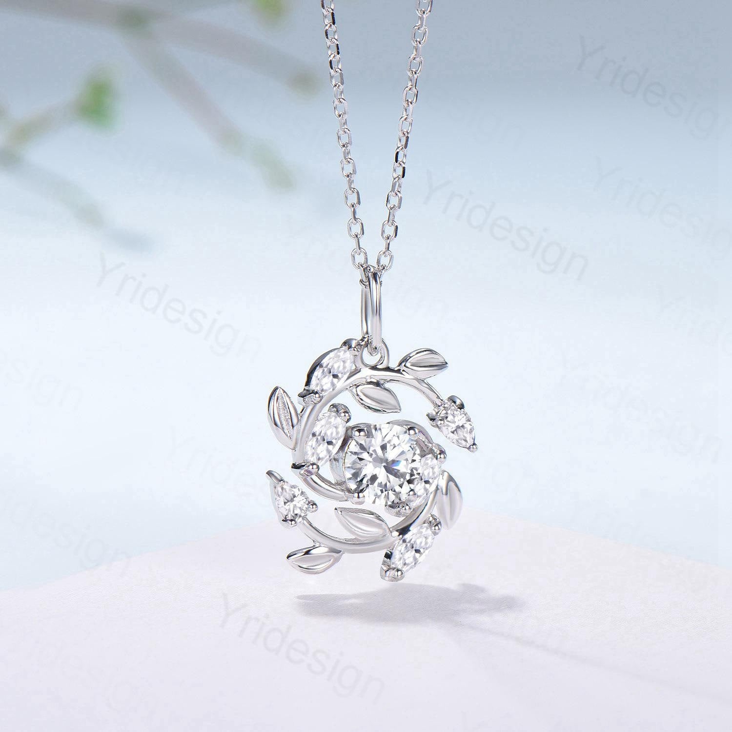 All stones are moissanite or lab grown diamonds 4pcs 4x2mm marquise cut 2pcs 3x2mm pear shaped 1pc 5mm round cut Chain: 16-18 Inches - PENFINE