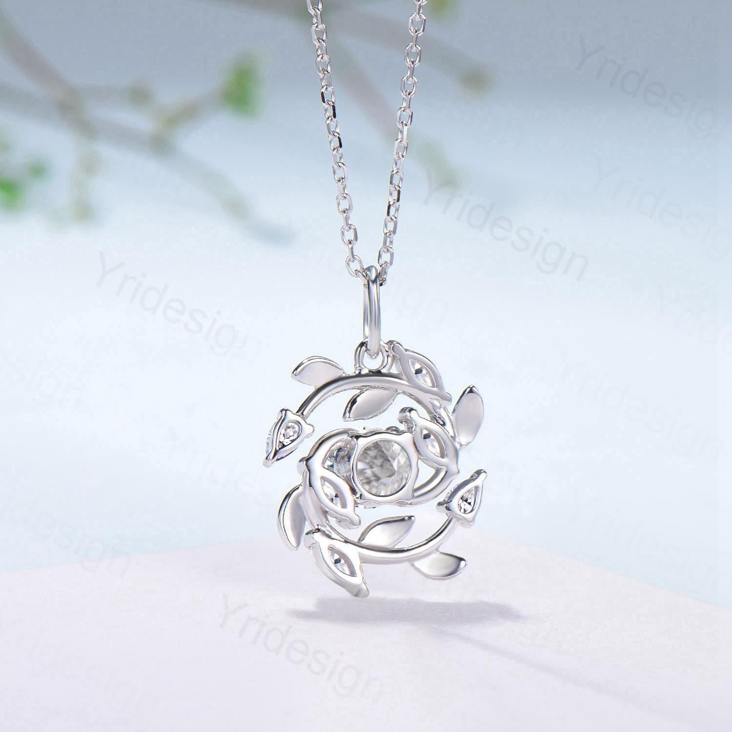 All stones are moissanite or lab grown diamonds 4pcs 4x2mm marquise cut 2pcs 3x2mm pear shaped 1pc 5mm round cut Chain: 16-18 Inches - PENFINE