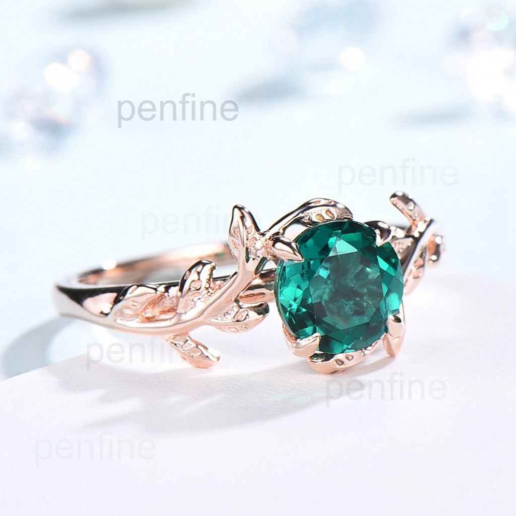 leaf emerald engagement ring