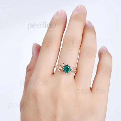 emerald engagement ring rose gold