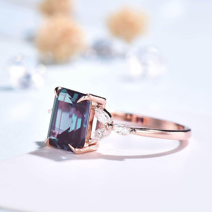 Emerald cut Alexandrite engagement ring rose gold side