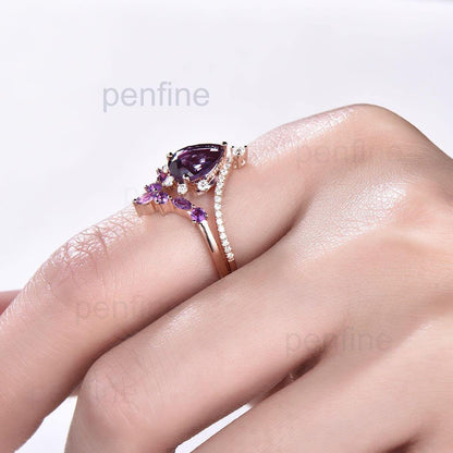 alexandrite engagement ring and amethyst band hand