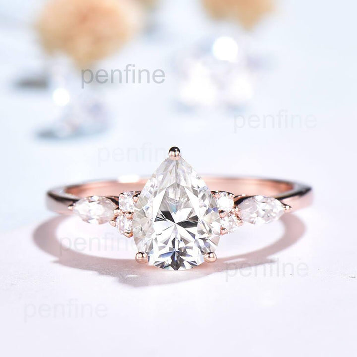 pear shaped moissanite engagement ring