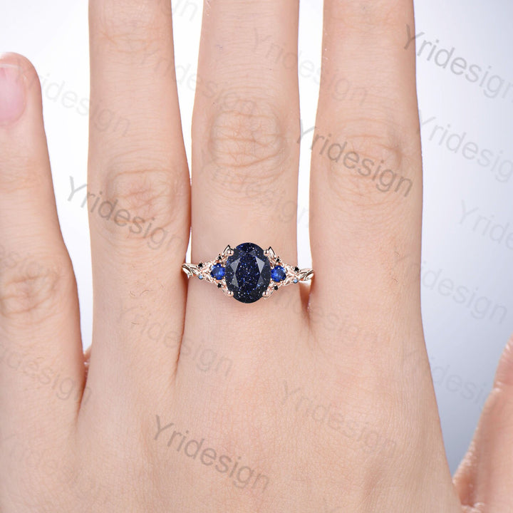 Nature Inspired blue sandstone ring unique oval cut galaxy goldstone engagement ring set floral leaves sapphire black stone wedding set - PENFINE